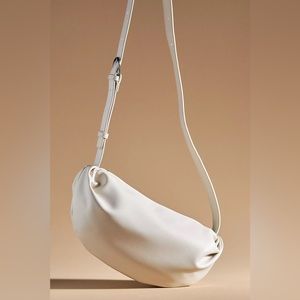 Ivory Oval Sling Bag from Anthropologie